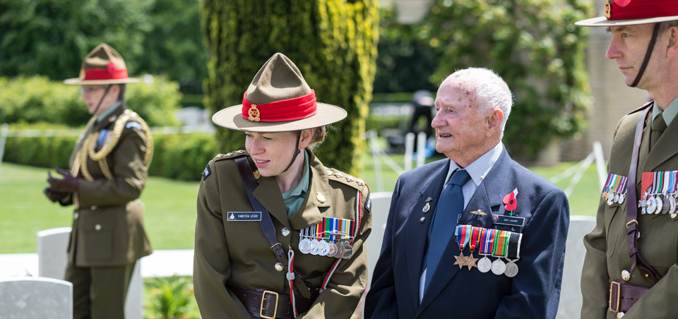 Veterans standing with their medals
